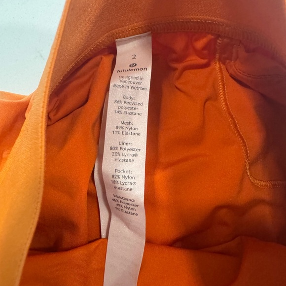 Size 2 Lululemon orange shorts special edition excellent used condition - Picture 2 of 4
